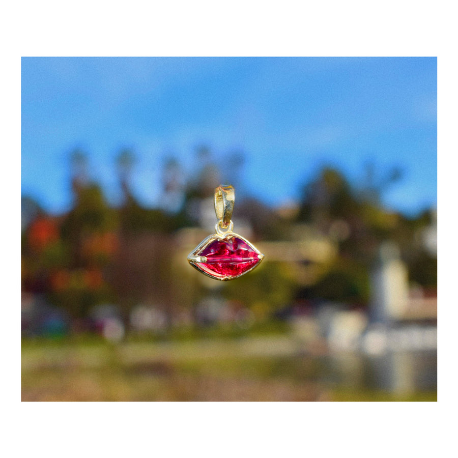 Sunkist Park (The Lip-Shaped Garnet Charm)